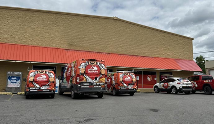 Crossroads Property Rescue service vehicles