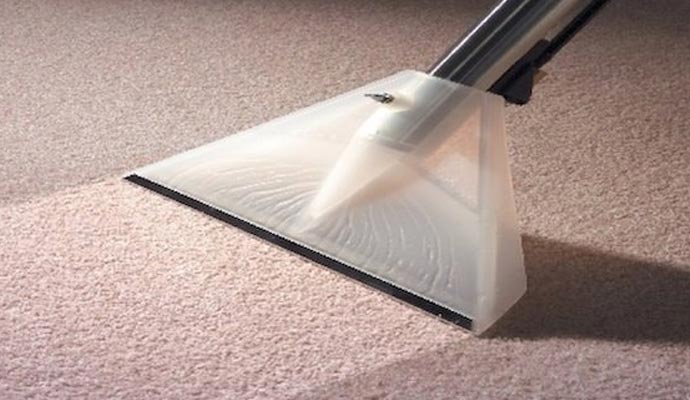 Carpet cleaning using a vacuum cleaner