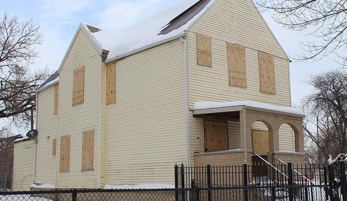 Boarded-up house