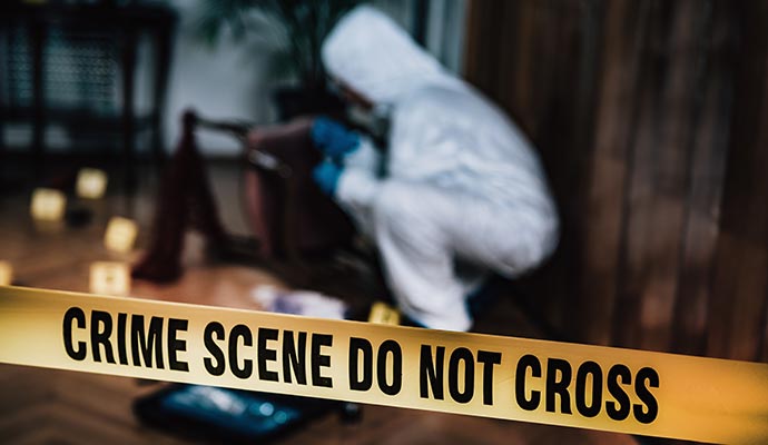 Professional worker cleaning biohazard