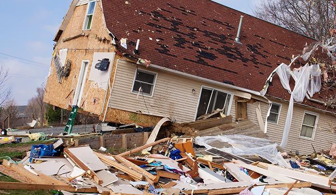 Residential house affected by severe storm showing visible damage