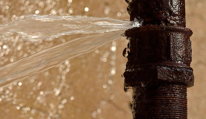 Water leaking from a broken water pipe joint